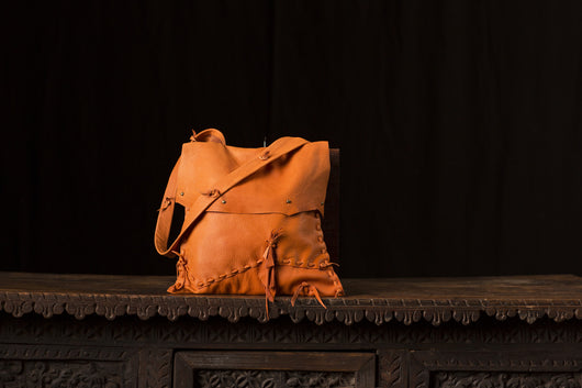 Soft Orange Leather with Brass colored Studs