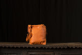 Soft Orange Leather with Brass colored Studs